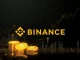 Binance logo over digital assets, symbolizing the strategic integration of yield-bearing stablecoins as Binance collateral for institutional capital efficiency.