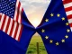 Flags of the EU and US in a standoff, symbolizing the escalating EU tariffs and transatlantic trade dispute.