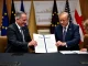 EU and US officials signing the Turnberry Agreement with a 15% tariff on key exports