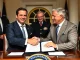 Coinbase and Circle CEOs attend a White House signing ceremony, marking a pivotal moment for stablecoin regulation and crypto legislation.