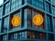 Cardone Capital's strategic Bitcoin investment depicted by a modern building integrating Bitcoin symbols, highlighting real estate crypto adoption.
