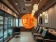 A Japanese nail salon, Convano, strategically investing in Bitcoin, symbolized by a digital BTC coin, highlighting their significant BTC holdings.