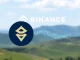 Ethena ENA logo alongside Binance's, representing the significant ENA deposit and its market implications.