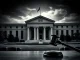 An unprecedented Fed lawsuit challenges the Federal Reserve's closed-door FOMC meeting, highlighting a clash over central bank independence.
