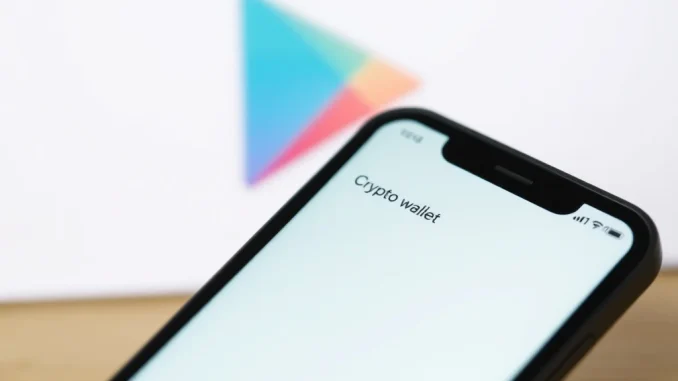 Google Play Store Crypto Policy: Crucial Clarity for Non-Custodial Wallets Unveiled A smartphone displaying a crypto wallet app logo, with the Google Play Store icon in the background, symbolizing the crucial Google Play Store crypto policy update.