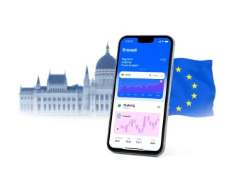 Revolut Crypto Staking on a smartphone screen against a backdrop of European regulation, illustrating the company's return to Hungary.