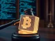 A digital gavel striking a blockchain block, symbolizing the legal implications of the Tornado Cash trial on crypto regulation and developer liability.