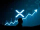 XRP token market surge after Chris Larsen's significant transfer, reflecting strong regulatory optimism and a bullish crypto market.