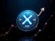 XRP coin glowing with rising graphs, symbolizing growth amid ETF speculation.