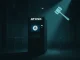 A cryptocurrency ATM with a legal gavel overlay, symbolizing the Athena Bitcoin indictment and ongoing Crypto ATM fraud investigations.