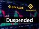 Binance platform displaying a delisting notice for ALPHA USDT futures, signaling an urgent update for traders.