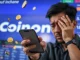 An investor reacts to the urgent Coinone delisting of Pencil Protocol (DAPP) on a mobile screen.