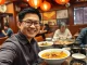 CZ enjoys Korean food during his South Korea visit, highlighting cultural exchange and crypto interest.