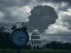A clock ticking down against the US Capitol, symbolizing the impending **government shutdown** and its potential **economic impact**.