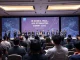 Attendees and speakers at the Korea RWA Summit discussing real-world assets and stablecoin technology, highlighting financial innovation.