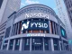Paxos Nasdaq listing potential shown by a stablecoin logo integrated with the Nasdaq building, symbolizing crypto's public market future.