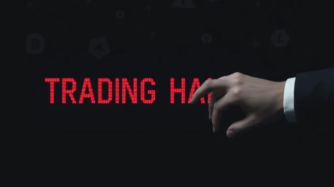 An urgent SEC trading halt sign on a stock ticker display, symbolizing market intervention due to cryptocurrency news.