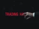 An urgent SEC trading halt sign on a stock ticker display, symbolizing market intervention due to cryptocurrency news.