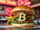 Steak 'n Shake's new Bitcoin Burger with a BTC logo bun, symbolizing crypto adoption in fast food payments.