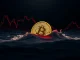 A Bitcoin (BTC) symbol sinking into a volatile market chart, illustrating the recent Bitcoin price drop below $114,000 and market uncertainty.