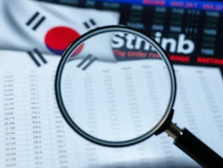 A magnifying glass examines digital data, symbolizing the extended Bithumb probe by a South Korean regulator into order book sharing practices.