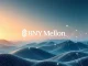 BNY Mellon's strategic move into tokenized deposits and blockchain payment systems, representing institutional crypto adoption.
