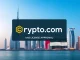 A digital rendering of the Crypto.com logo alongside Dubai's skyline, symbolizing the **Crypto.com UAE license** approval for digital payments.