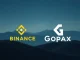 Binance and Gopax logos symbolizing GoFi compensation and financial relief for South Korea crypto investors.