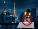 A gavel over crypto symbols in front of a Tokyo skyline, symbolizing Japan crypto regulations cracking down on insider trading.