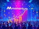 Momentum community sale success represented by digital coins and a growth chart, highlighting the impressive $82.7M crypto fundraising.