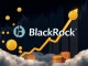 BlackRock's IBIT logo with Bitcoin symbols, illustrating its dominant role in driving spot Bitcoin ETF flows and shaping crypto market trends.
