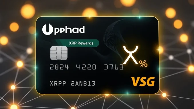 A hand holding an Uphold debit card, highlighting the exciting opportunity to earn XRP rewards on everyday purchases.