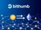 Bithumb's announcement of UXLINK token swap, illustrating the migration from Arbitrum to Ethereum blockchain networks.