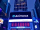 Animoca Brands logo superimposed on the Nasdaq building, symbolizing its pursuit of a public listing through a reverse merger.