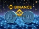 Binance suspension of Mantra (OM) and Enjin Coin (ENJ) deposits for crucial network upgrades, showing crypto symbols paused.