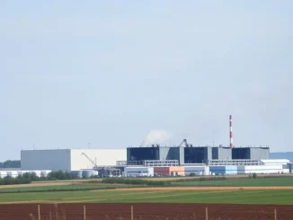 Smoke rises from the damaged Bitdeer Bitcoin mining facility in Ohio after a recent fire.