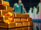 A stack of gleaming gold bars symbolizing the recent surge in spot gold price and robust market performance.