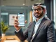 Dubai Insurance executive using a crypto wallet for insurance payments in a modern UAE office.