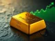 Gold bullion bar representing the historic surge in gold price to a new all-time high above $4,900.