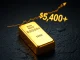 Gold bullion bar with chart showing gold price breaking the $5,400 all-time high record.