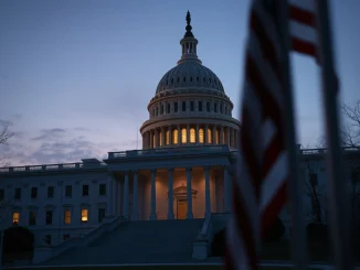 US Capitol building at night as Trump and Democrats reach government shutdown spending deal