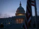 US Capitol building at night as Trump and Democrats reach government shutdown spending deal