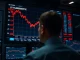 Bitcoin price chart falling below $70,000 as ETF outflows impact the cryptocurrency market.