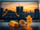 Analyst chart showing the BTC vs Gold ratio hitting a record low, with Bitcoin and gold symbols.