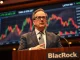 BlackRock CEO Larry Fink discusses cryptocurrency as the next wave for global finance during a financial conference.