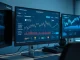 DeepSnitch AI analytics dashboard monitoring Bitcoin ETF and cryptocurrency trading data in a professional setting.