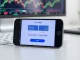 Smartphone displaying the Gem Wallet interface for secure Bitcoin and USDT crypto swaps in 2026.