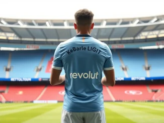 Manchester City player showcasing new Revolut back-of-shirt sponsorship deal at Etihad Stadium