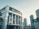 Swiss private bank Maerki Baumann expands crypto services in UAE after ADGM regulatory approval.