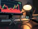 Analyst examining XRP price chart showing a 58% decline to the $1.30 support level.